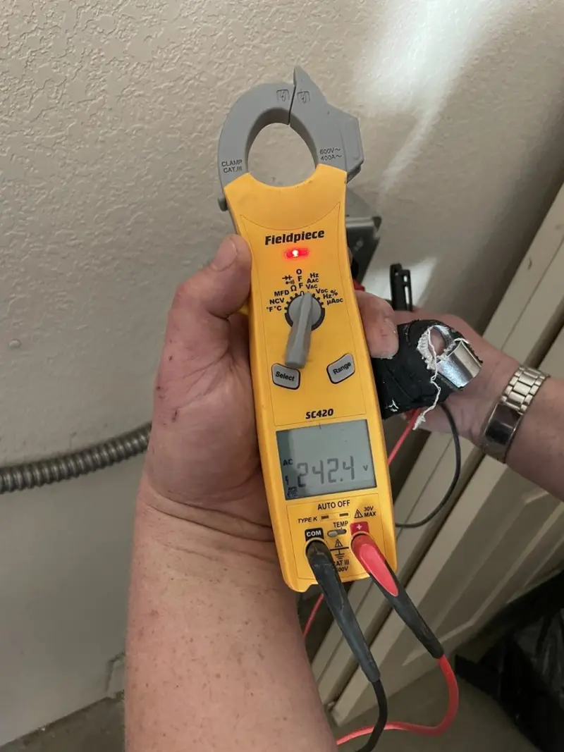 Voltage testing with clamp meter during Hot Tub / Pool Electrical Wiring in Miamisburg